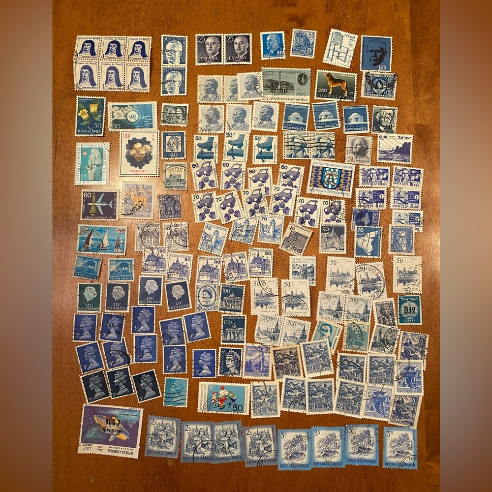 Vintage international & USA Postal Stamps - over 100 postmarked. Blue #1